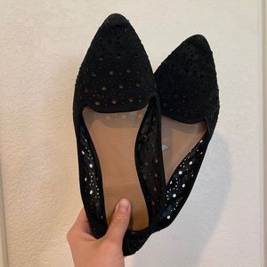 Black eyelet flats